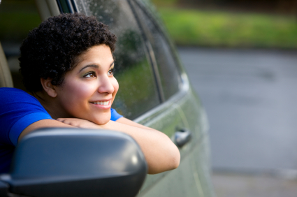 Girl looking out of car window